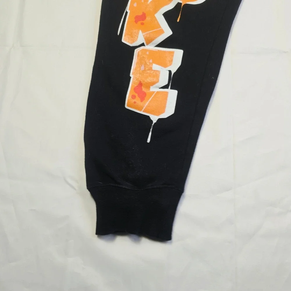 Never Broke Again Me'ns Joggers Size Small Black Orange Graffiti Graphic T6